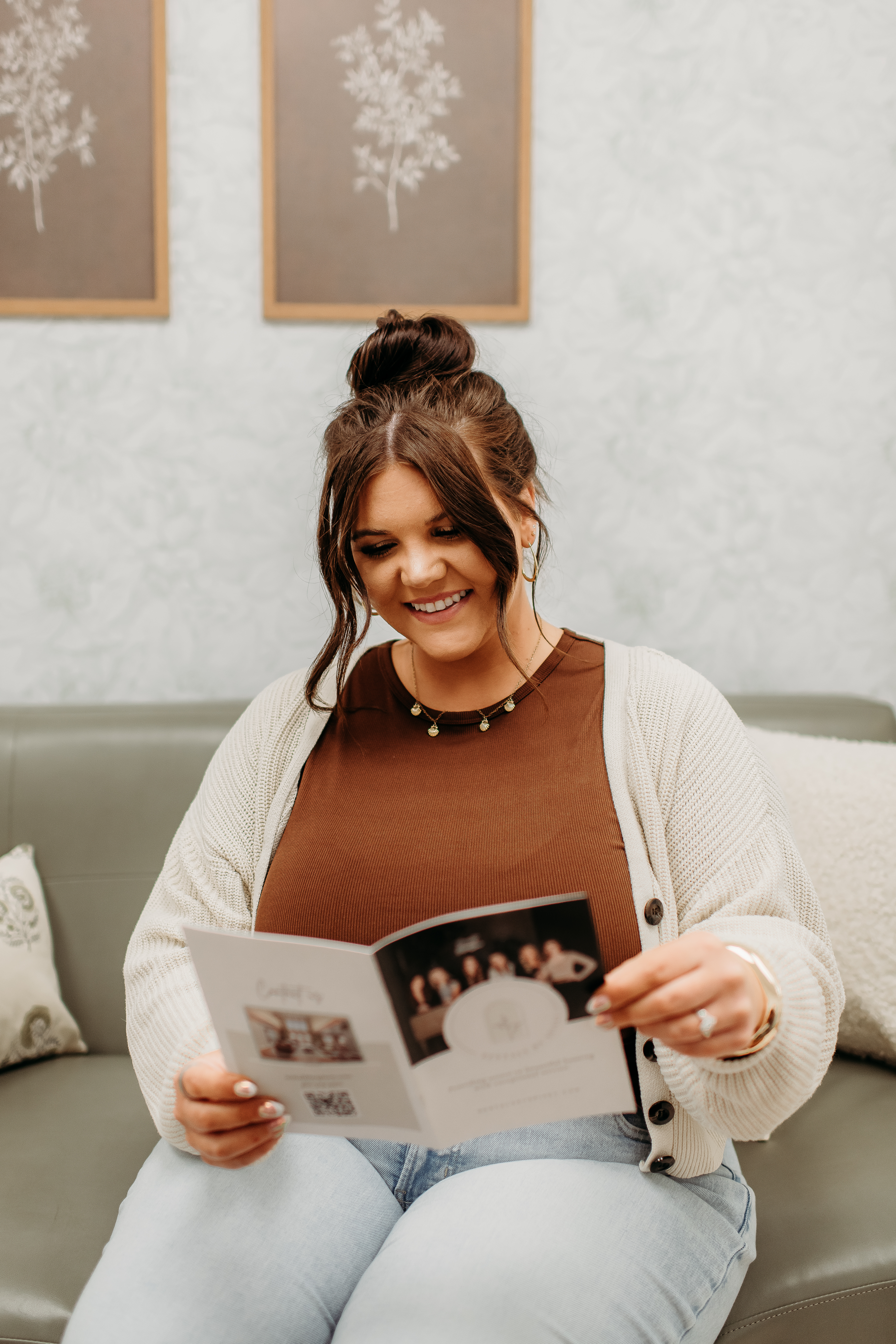 A Rentals by Spivey team member reading the Resident Guide