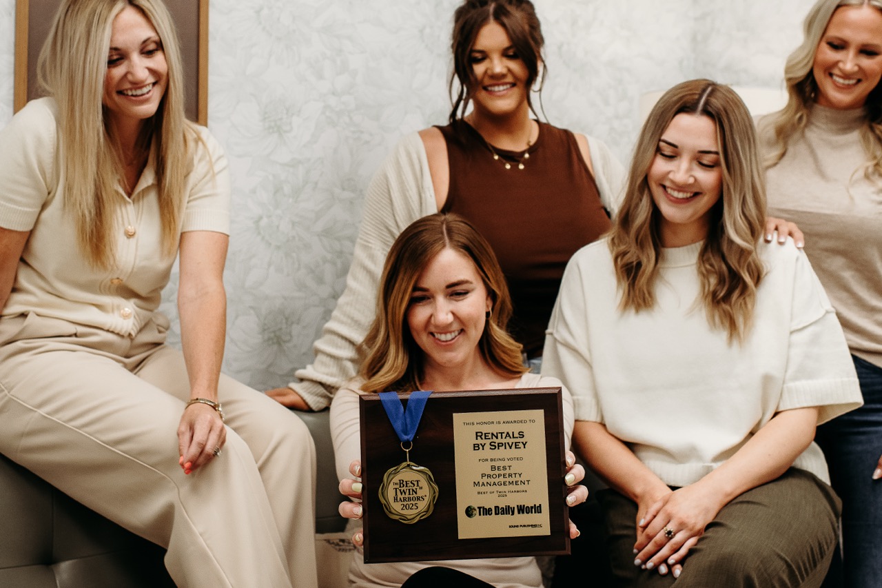 The Rentals by Spivey team with their Best of Twin Harbors award